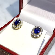 CERTIFIED 1.32 Carats, Ceylon Blue sapphires and 0.88 carat of E/VVS, natural diamonds, set in handmade 4.5 grams, 18K solid yellow gold earrings. ONE OF A KIND HANDCRAFTED EARRINGS. IN CASE OF RETURN FOR US BUYERS. BUYERS MAY SEND THE ITEMS BACK TO OUR US-BASED OFFICE IN SALT LAKE CITY, UTAH Our jewelry are specially designed, and are delicately handcrafted by local, professional goldsmiths, who have decades of experience in creating fine jewelry. SUGGESTED RETAIL VALUE: 6,900 THE ITEM YOU SEE Gia Certified Sapphire Earrings For Formal Occasions, Classic Oval Sapphire Diamond Earrings, Classic Blue Oval Diamond Earrings, Luxury Sapphire Diamond Earrings In Yellow Gold, Gia Certified Sapphire Diamond Earrings For Formal Occasions, Blue Sapphire Oval Diamond Earrings, Formal Gia Certified Sapphire Diamond Earrings, Luxury Sapphire Yellow Gold Earrings, Blue Halo Diamond Earrings Luxury Style