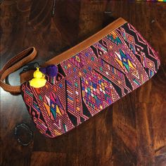 Brand New With Tags Huipil Clutch Wristlet Made From Vintage Guatemalan Textiles And Genuine Leather By Indigenous Artisans For Gypsies And Debutantes. Each Piece Is A One Of A Kind And Is Made From An Authentic Handmade Huipil. Multicolor Clutch With Adjustable Strap For Gift, Multicolor Bags With Wrist Strap For Daily Use, Handmade Wristlet For Everyday, Adjustable Wristlet With Wrist Strap, Multicolor Daily Use Bag With Wrist Strap, Multicolor Bag With Wrist Strap For Daily Use, Multicolor Wristlet For Everyday Use, Adjustable Multicolor Rectangular Clutch, Multicolor Pouch Bag With Wrist Strap