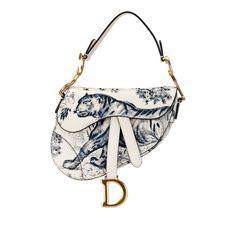 The Mini Toile de Jouy Saddle bag features a printed leather body, a flat leather shoulder strap, and a front flap with a magnetic snap closure. It carries an AB condition rating. Exterior Front stained with Other. Exterior Handle Creased. Exterior Top stained with Other. Interior Lining Creased. Dimensions: Length 18cm Width 6cm Height 15cm Hand Drop 12cm Original Accessories: This item has no other original accessories. Color: White Material: Leather x Calf Country of Origin: Italy International Buyers — Please note that import duties are included in the item price. However, sales tax is not included and remains the buyer's responsibility. For U.S. orders exceeding $2,500, the consignee may be required to provide a Social Security Number or IRS number if requested by customs. You may vis Vintage Luxury Bags, Christian Dior Saddle Bag, Mini Toile, Christian Dior Bag, Embroidered Leather