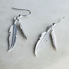 925 Sterling Silver Feather Drop Earrings Simple earrings to add to any outfit for any time of the day or week. >Metal: 925 Sterling Silver >Width:7 mm. >Height:45 mm >Nickel Free >No Allergic reaction >30 days return policy ++Items come in a gift box ready to be gifted Please contact me if you have any questions about the jewelry you are interested in buying. My Shop: https://www.etsy.com/shop/banujewelryusa Follow BANU Jewelry on Facebook, Instagram and other social media sit Elegant Silver Feather Earrings, Elegant Adjustable Feather Earrings, Adjustable Silver Feather Earrings, Adjustable Silver Earrings With Feathers, Sterling Silver Feather Earrings Gift, Elegant Feather Earrings, Drop Earrings Simple, Earrings Bird, Earrings Feather