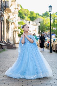 Blue flower girl dress with multilayered skirt, the satin corset with sequins and butterfly lace, decorated with the detachable сape.  The dress fastens with a vertical corset and zipper. Specially designed of unique girls dress pattern for your chic special occasions, wedding, birthday, first communion, pageant, bridesmaid party, Christmas. Item material: upper layer of the skirt - satin and seqiuns lace, zipper middle layer of the skirt - tulle lower layer of the skirt - taffeta corset - satin Flower Girl Wedding Dress, Girl Wedding Dress, Wedding Dress Tulle, Unique Girls, Flower Girl Dresses Blue, Flower Girl Wedding, Butterfly Lace, Skirt Satin, Skirt Tulle