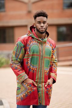 The African spirit collection is here! Wear clothing that releases your African spirit, and puts a smile on your face. That's exactly what this African summer jacket will do, the moment you put it on! We Are A Brand With A Purpose.  Feel Good in our clothing, knowing that we provide a positive social impact on the economy in West Africa. We source and produce everything in West Africa- providing over 30 full time jobs for the local community. See exactly who made your clothing directly on www.continentclothing.com This Jacket is perfect up until Autumn and can be used as a colourful overcoat in Winter with its oversized design. Hamed Hoodie features-     Hooded jacket Design     Oversized Overcoat Design     2 side pockets     Comfy fit     Drawstring hood     100% African Wax Print www.co Casual Red Outerwear With Stand Collar, Multicolor Cotton Outerwear With Stand Collar, Red Cotton Long Sleeve Windbreaker, Red Hooded Cotton Outerwear, Red Long Sleeve Cotton Windbreaker, Red Cotton Long Sleeve Outerwear, African Jacket, Dashiki For Men, Summer Coat