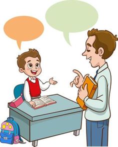 a man talking to a little boy sitting at a desk with an open book in front of him