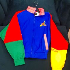 Never Worn. New Without Tags. Nonsmoking Home. Super Cool Jacket With Multiple Colors. Built In Hood. Very 90s. It's A Men's Xs, But Can Be Worn By A Woman Too. Only Selling Because It's Tight On My Hips. 90s Style Patchwork Outerwear For Streetwear, 90s Inspired Long Sleeve Streetwear Outerwear, 90s Style Multicolor Winter Track Jacket, 90s Inspired Multicolor Long Sleeve Outerwear, 90s Multicolor Outerwear With Pockets, 90s Style Multicolor Outerwear With Pockets, Vintage Multicolor Track Jacket For Winter, Casual Blue Track Jacket With Patchwork, Vintage Multicolor Winter Track Jacket