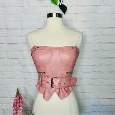 Item: Sleeveless Top Brand: Boutique Size: Small Colour: Dusty Pink Features: High Quality Faux Leather, Zipper Detailing On The Front, Removable Belt, Working Back Zipper Material: 100% Polyester Shipping: $4.99 Condition: Excellent Condition, No Known Flaws Measurements: - Back Length: 8” - Side Length: 9” - Front Length: 12” - Bust: 30” - Waist: 26” - Belt Length: 32” Pink Leather Top, Leather Bustier Top, Leather Bustier, Belt Length, Bustier Top, Leather Zipper, Zipper Detail, Pink Leather, Leather Top