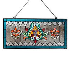 a stained glass window hanging on a chain