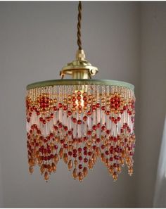 a chandelier hanging from a ceiling in a room