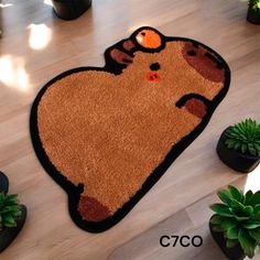 a brown bear rug on the floor next to potted plants