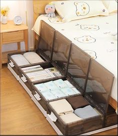 the bed is made up and has several compartments for diapers to be placed in