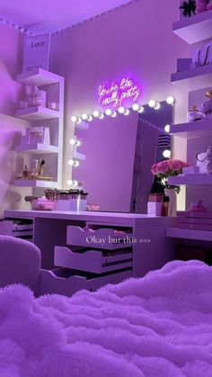 a bedroom with purple lighting and pink fur on the bed, in front of a large mirror