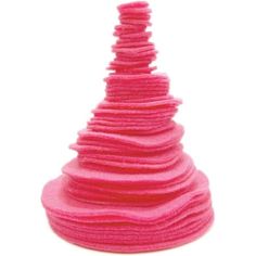 a pink cupcake that is shaped like a cone