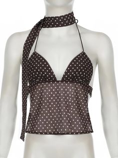 Why You'll Love It With its classic polka dot pattern and charming ribbon detailing, this top combines fun and elegance. The slight stretch in the fabric offers comfort, while the backless design adds a flirty, modern touch. Perfect for summer outings or layered under a jacket for cooler evenings. Features Elasticity: Slight Stretch Fabric Type: Knitted Material: Polyester, Spandex Pattern Type: Polka Dot Decoration: Backless Tops Type: Camis Sleeveless Polka Dot Top For Beach, Fitted Triangle Top With Tie Back, Summer Party Polka Dot Tops, Fitted Polka Dot Sleeveless Top, Polka Dot Sleeveless Party Top, Elegant Polka Dot Tops For Summer, Fitted Polka Dot Tops For Beach, Elegant Fitted Polka Dot Top, Polka Dots Tops