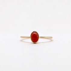 Natural Red Coral Oval Cabochon Gemstone Stackable Ring,.Semi Precious Gemstone Ring in 14k SOLID GOLD For Her from our Capsule Jewelry Collection.  Coral Stone is set in Bezel Setting in our Factory. Gold Ring AAA+ Quality. Perfect Gift For Everyday or Power Birthstone Gift for Your Loved Ones. ►  DIMENSIONS : ◆ Gemstone : Red Coral                       ◆ Stone size : 5*4 mm                           ◆ Gross Weight : 1.200 grams ◆ Shank Width : 1 mm      ◆  Material :  14k Yellow Gold      EAC Minimalist 14k Gold Oval Cabochon Jewelry, Fine Jewelry Stackable Oval Rings, Fine Jewelry Stackable Oval Ruby Ring, Stackable Oval Ruby Ring In Fine Jewelry, Elegant Oval Ruby Stackable Ring, Delicate Stackable Oval Rings, Delicate Oval Stackable Rings, Fine Jewelry Solitaire Oval Cabochon, Minimalist 14k Gold Jewelry With Cabochon