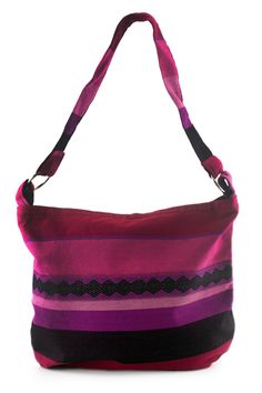 Luscious shades of purple fuchsia lilac and pink bring bold elegance to a shoulder bag adorned with black concentric diamonds. From Yama Aj Chixot Artisan Group the bag is sewn together by one team with a cotton fabric woven by another team of experts on the pedal loom. The shoulder bag has a pocket in the lined interior. The fabric for this bag is cut from a larger piece woven on a pedal loom therefore the order of colors and the positioning of the patterns my vary slightly resulting in a uniqu Purple Square Bag With Adjustable Strap, Purple Satchel Shoulder Bag With Adjustable Strap, Purple Square Satchel For Travel, Purple Rectangular Hobo Bag With Adjustable Strap, Purple Hobo Tote Bag With Adjustable Strap, Purple Adjustable Strap Hobo Tote Bag, Purple Square Shoulder Bag For Everyday Use, Purple Rectangular Hobo Bag For Travel, Purple Tote Shoulder Bag With Adjustable Strap