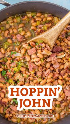 a pot full of beans and ham with a wooden spoon in it that says hoppin'john