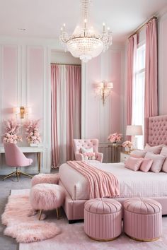 a bedroom with pink walls and furniture in the corner, along with chandelier