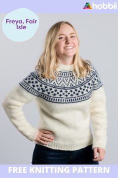 a woman wearing a sweater with fair isle knitting pattern