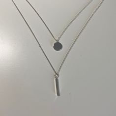 Minimalist Silver Layered Necklace. Never Worn, Excellent Condition. Minimalist Metal Necklaces For Layering, Silver Minimalist Layered Necklace With Round Pendant, Round Metal Layered Necklace In Minimalist Style, Simple Silver Necklaces For Layering, Minimalist Layered Metal Necklace, Minimalist Round Layered Metal Necklace, Minimalist Round Metal Layered Necklace, Minimalist Metal Layered Necklace With Delicate Chain, Silver Minimalist Layered Necklace With Double Chain