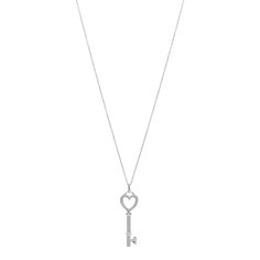 This is an authentic TIFFANY 18K White Gold Diamond Mini Heart Key Charm Pendant Link Necklace. The necklace is crafted of 18 karat white gold and features a link chain and a heart motif key pendant set with round brilliant cut diamonds, approximately .05 total carat weight. Heart Motif, Heart Key, Heart And Key, Mini Heart, Key Pendant, Link Necklace, Round Brilliant Cut Diamond, Pendant Set, White Gold Diamonds