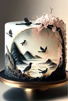 a white and black cake with birds on it