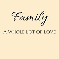 the words family, a whole lot of love written in black on a beige background