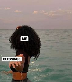 a woman sitting in the water with her hand on her hip and two words that read me, blessinges