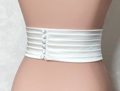 The Couture Pleated Bridal Belt is a stunning and elegant accessory that adds a touch of sophistication to any wedding dress. Handmade with meticulous attention to detail, this belt is crafted from luxurious matte satin, known for its smooth texture. The wide pleated design measures 3.5 inches (9cm) in width, creating a visually striking effect that cinches the waist and accentuates the curves. Width 3.5 inches (9cm) Fabric: Satin Duchess (shown in the photo) Color: light ivory (shown in the pho Belt Design For Dress, Belt For Wedding Dress, Bridal Nightgown, Satin Belt, Wedding Sash Belt, Duchess Satin, For Wedding Dress, Wedding Dress Fabrics, Etsy Wedding Dress