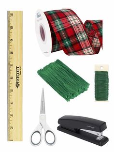 the supplies needed to make this holiday craft include yarn, scissors, ribbon, and tape