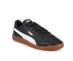 a black and white puma sneakers with gum soles