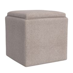 a large square ottoman with a cover on the top and bottom, in light grey fabric