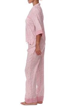 Sweet dreams are made of nights that start with comfy pajamas including a three-quarter sleeve top and matching bottoms. 31" inseam Front button closure; notched collar; three-quarter sleeves; chest patch pocket Pants have elastic/drawstring waist; side-seam pockets 100% rayon Machine wash, tumble dry Imported Pink Daywear Set With Long Pants, Matching Set Sleepwear For Pajama Party, Spring Long Sleeve Pajama Party Pant Set, Spring Long Sleeve Pant Set For Pajama Party, Summer Sleepwear With 3/4 Sleeves, Feminine Relaxed Fit Loungewear Sets, Feminine Sleepwear With Long Pants For Pajama Party, Feminine Long Pants Sleepwear For Pajama Party, Casual Spring Sleepwear With 3/4 Sleeve