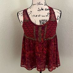 Ecote Red/Maroon Print Sheer Top In Small Size. Sleeveless, Razorback, Brass Brads Accents. New With Tags Condition. Color: Maroon. Please Refer To Pictures For Best Description And Condition Verification. Color May Slightly Vary Due To Photographic Lighting And/Or Monitor Settings. Red Embellished Sleeveless Top, Red Summer Tank Top For Festivals, Summer Festival Red Tank Top, Red Tank Top For Summer Festivals, Crochet Bra Top, Urban Outfitters Tank Top, Boho Clothes, Sheer Tank Top, Blue Floral Blouse