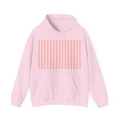 This Coral Pink Stripes Hoodie offers a classic and chic look with its pink and white vertical stripes. The soft colors and cute design make it perfect for any girly outfit. Stay pretty and stylish with this cozy hooded sweatshirt. Stay comfy and cozy with this unisex heavy blend hooded sweatshirt. Made with a thick blend of cotton and polyester, it feels plush, soft and warm, a perfect choice for any cold day. In the front, the spacious kangaroo pocket adds daily practicality while the hood's d Pink Cotton Hoodie Sweatshirt, Pink Hoodie Sweatshirt, Trendy Pink Sweatshirt With Drawstring Hood, Striped Cotton Hooded Sweatshirt, Striped Cotton Sweatshirt With Drawstring Hood, Striped Sporty Hoodie With Drawstring, Casual Striped Hoodie With Drawstring Hood, Sporty Striped Hoodie With Drawstring, Trendy Pink Hoodie For Winter