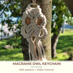 macrame owl keychain hanging from a tree