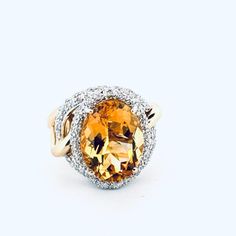 "\"Vintage Estate 14k Two-Tone Gold Citrine Diamond Halo Ring Size 8 10g\" Description: Elevate your jewelry collection with this exquisite Vintage Estate 14k Two-Tone Gold Citrine Diamond Halo Ring. Crafted from luxurious 14k gold, this ring features a large oval cushion-cut citrine gemstone set within a dazzling diamond-encrusted halo setting. The contrasting two-tone gold adds a touch of sophistication, while the hallmark 14k 585 ensures its authenticity and quality. With a weight of 10.0 grams, this statement piece is sure to turn heads wherever you go. Perfect for adding a touch of vintage glamour to any ensemble, this ring is a timeless treasure you'll cherish for years to come. Features: * Statement Ring Size: Womens Size 8 Condition: Pre-Owned  Phenomenal Preowned Condition  ETSY" Diamond Halo Ring, Halo Setting, Citrine Gemstone, Halo Diamond Ring, Vintage Glamour, Halo Ring, Timeless Treasures, Diamond Halo, Halo Rings