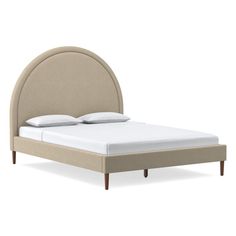 an upholstered bed with two pillows and no headboard is shown in front of a white background