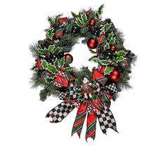 a christmas wreath with holly and ornaments