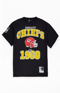 PacSun exclusive! Gear up for game day with the Kansas City Chiefs T-Shirt from NFL x Aleali May, built for true fans. Featuring short sleeves, a crew neckline, bold Kansas City Chiefs graphics on the front and back, plus an NFL woven label at the hem and NFL branding on the sleeve, this tee delivers classic style with a sporty streetwear edge.Solid color teeShort sleevesCrew necklineNFL graphicsNFL woven labelStandard fit100% cottonMachine washable NFL x Aleali May Mens Kansas City Chiefs T-Shirt - Black size Medium Aleali May, Sporty Streetwear, Woven Label, Top Graphic Tees, Kansas City Chiefs, Pacsun, Game Day, Kansas City, Crew Neckline