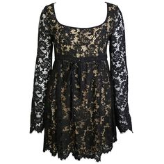 - Iconic Gucci by Tom Ford lace dress from spring/summer 1996 collection. This dress is one of the highlight in the collection. - Between size M to L. (No size tag inside the dress). - Bust: 33 inches. Length: 31 inches. Waist: 28inches. Sleeve: 25inches (Approximately measurements). - 70% Cotton, 20% Rayon, 10% Polyamide. Interior lining: 82% Rayon, 18% Silk. 1996 Runway, Gucci Campaign, Tom Ford For Gucci, Lace Spring Dress, Long Sleeve Lace Mini Dress, Gucci By Tom Ford, Ford Black, Gucci Dress, Black Lace Mini Dress