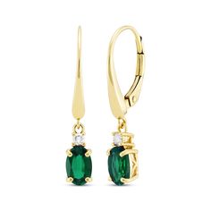 Treat her to a sweet May birthday surprise with these dainty dangle earrings. 10K yellow gold Each dangle features a bright oval-cut lab-created emerald topped with a round diamond The long ear wires lend graceful detail Lever-back wires Total diamond weight is 1/20 carat Oval May Birthstone Earrings, Green Oval Earrings With Diamond Accents, Yellow Gold Oval Emerald Earrings, Fine Jewelry Oval Emerald Earrings, Yellow Gold Tourmaline Dangle Earrings, Dainty Dangle Earrings, Green 14k Gold-filled Dangle Earrings, May Birthday, Lab Created Emerald