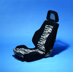 a black and white car seat on a blue background