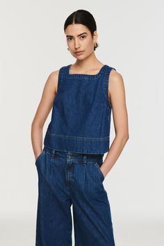 With its square neck and contrast top-stitching, the Meg top is an everyday staple that's easy to dress up or down depending on your mood. Layer with a crisp white shirt or pair with your favourite jeans for a way to embrace the statement-making denim-on-denim trend, the ALIGNE way. Denim Waistcoat, Medium Tv Show, Contrast Top, Shell Top, Technology Fashion, Shell Tops, Celebrity Lifestyle, Denim Diy, Square Neck Top