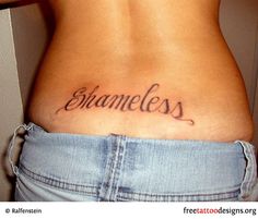 a woman's back with the words shameless written on her lower back tattoo