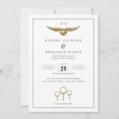 an elegant wedding card with gold scissors