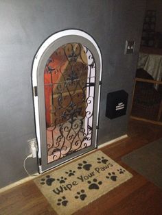 an image of a dog door with paw prints on the front and back doors,