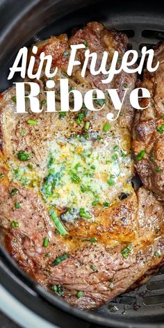 two steaks cooking in an air fryer with the words, ain fruyen ribeye