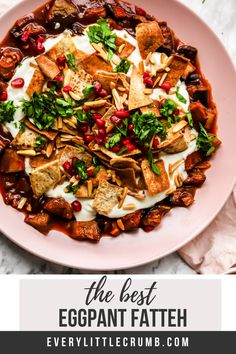 the best eggpant fath recipe is shown on a pink plate with tortilla chips and pomegranates