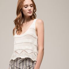 Knitted Tank Top With Tie Tassel Back. Product Details Knit Tank Top Tassel Tie Back Scalloped Edge Soft Lightweight Knit Styling Tip: This Is A Must-Have For Summer. This Soft Knitted Tank Is Super Adorable And Can Be Worn With Shorts, Skirts, Jeans, And Pants. This Tank Can Be Styled As Either Elegant Or Casual Depending On Where You're Headed And Your Mood. Think Of Pairing Pearls, Gold Hoops, Or Diamond Rhinestone Studs. This Lightweight Tank Will Keep You Cool And Looking Stylish All River Tank Tops, Bow Back Top, White Boho Tops, Floral Chiffon Blouse, Ruffle Bell Sleeve, Ruffle Crop Top, Moon River, White Long Sleeve Shirt, Knit Tank Top