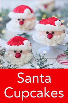 santa cupcakes are decorated with white frosting and red noses