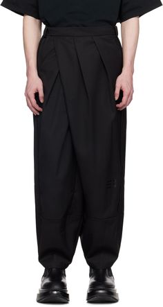 Wide-leg tapered wool-blend twill trousers. · Asymmetric layered construction · Belt loops · Four-pocket styling · Offset hook-eye closure · Logo bonded at leg · Piping at outseams · Full satin lining Supplier color: Euphoric black Techwear Pants With Belt Loops For Work, Techwear Tapered Leg Pants For Work, Spring Techwear Pants For Workwear, Techwear Straight Pants For Work, Techwear Trousers For Workwear, Techwear Style Straight Pants For Work, Techwear Pants For Work, Techwear Pants For Workwear In Fall, Fall Techwear Pants For Work